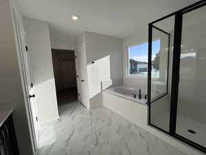 Bathroom with independent shower and bath