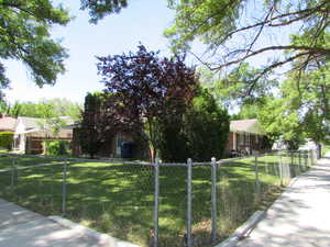 View of front of property featuring a front lawn