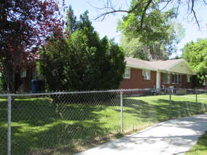 View of front of property with a front lawn