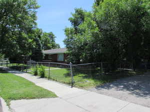 View of front of property with a front yard