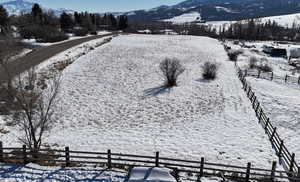 Property view of mountains with a rural view