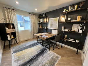 Office featuring wood-type flooring