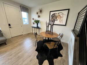 Dining room featuring light wood-type flooring