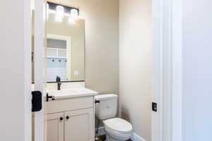 Bathroom with toilet and vanity