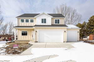 View of front of home with a garage