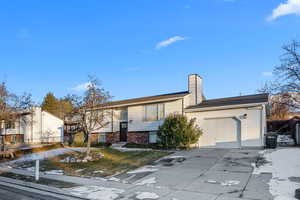 View of front of home with a garage