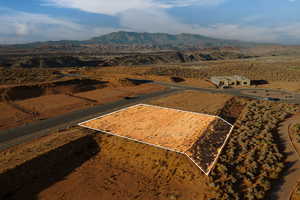 Birds eye view of property featuring a mountain view on the 17th hole of golf course