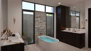 Bathroom with vanity, a tub, and hardwood / wood-style floors