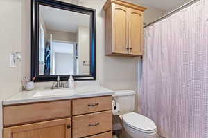 Bathroom featuring toilet and vanity