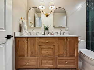 Bathroom featuring toilet and vanity