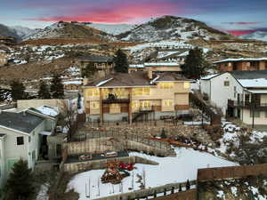 Exterior space with a mountain view and a playground