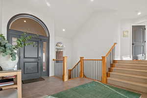 Entryway with vaulted ceiling