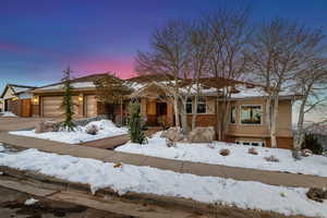 View of front of property with a garage