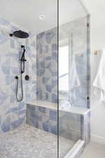 Bathroom with tiled shower