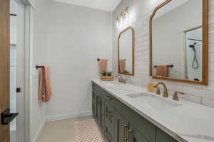 Bathroom with vanity and tile patterned flooring