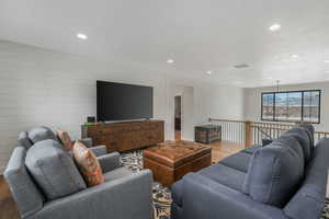 Bonus Loft Family Room with wood-style floors