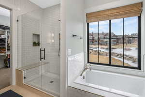 Bathroom with independent shower and bath