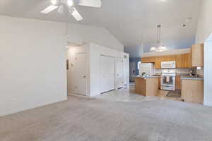 Family room, kitchen, dining area.