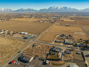 Birds eye view of property with a mountain view