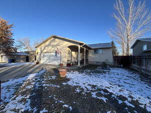 Ranch-style house with a garage