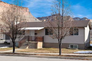 View of front of property with a mountain view