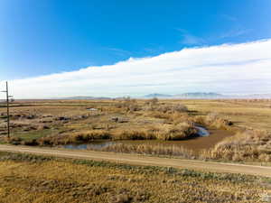 Drone / aerial view featuring a mountain view and a rural view