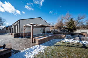 Exterior space featuring a pergola, a yard, and a patio