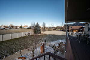 View of yard featuring a deck