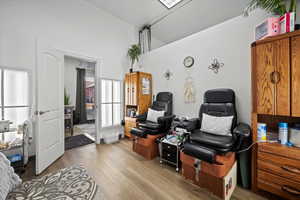 Sitting room featuring light hardwood / wood-style floors