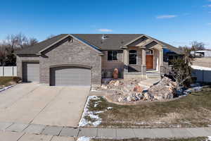 View of front of home featuring a garage