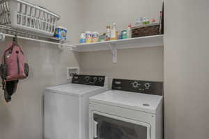 Clothes washing area with washer and dryer