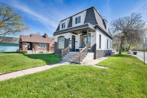 View of front of house with a front lawn