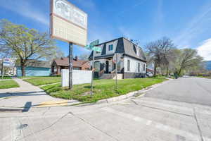 View of front of property with a front lawn