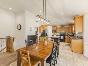 Tiled dining space with sink