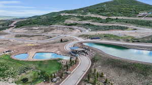 Bird's eye view featuring a water and mountain view