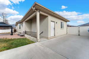 RV parking behind the fence and basement entrance