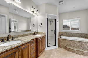 Primary Bath with double sinks, separate tub and shower