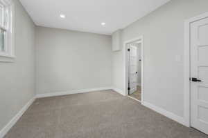 View of carpeted spare room