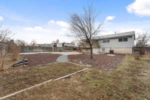 View of yard featuring central air condition unit