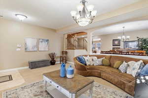 Living room featuring a chandelier