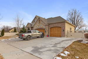 View of front of property with a garage