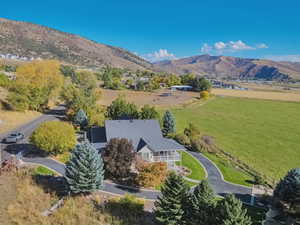 Drone / aerial view featuring a rural view and a mountain view