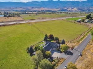 Aerial view with a rural view and a mountain view