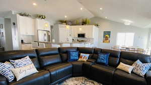 Living room with lofted ceiling
