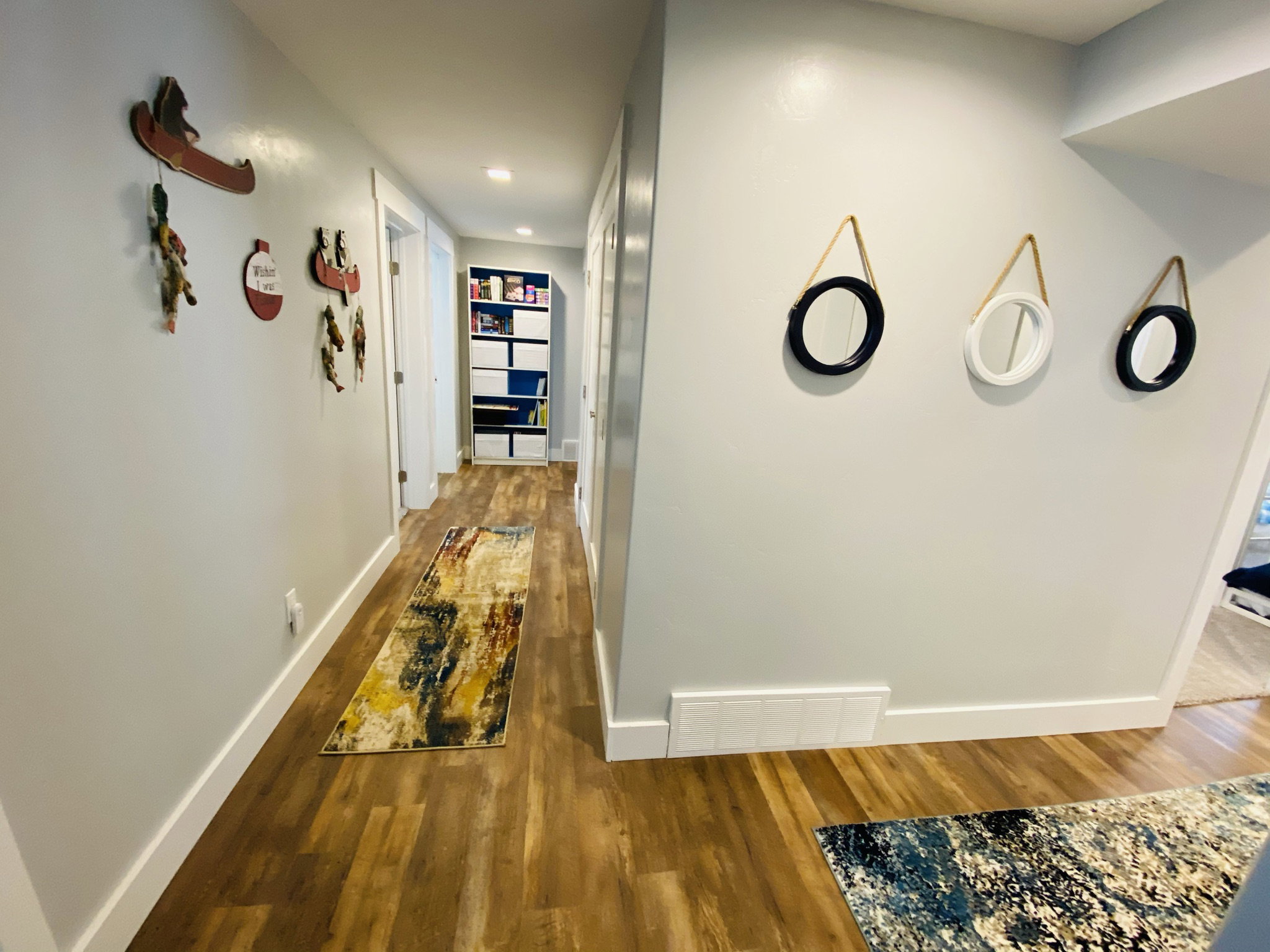 Hall featuring wood-type flooring