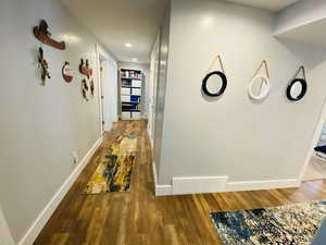 Hall featuring wood-type flooring