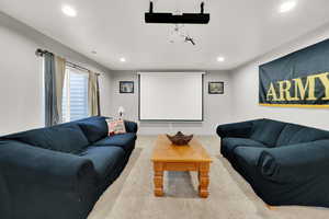 Family room in basement with home theater