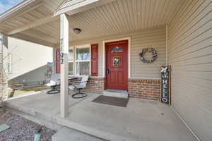 Property entrance featuring a porch