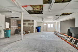 Basement featuring a drop ceiling