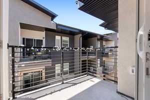 View of patio / terrace with a balcony